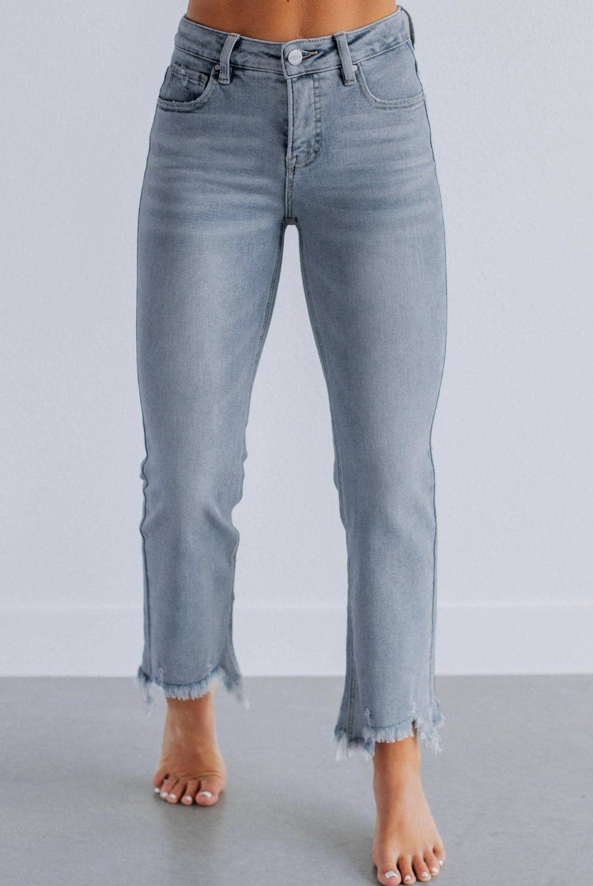 High-waisted ripped frayed straight-leg jeans