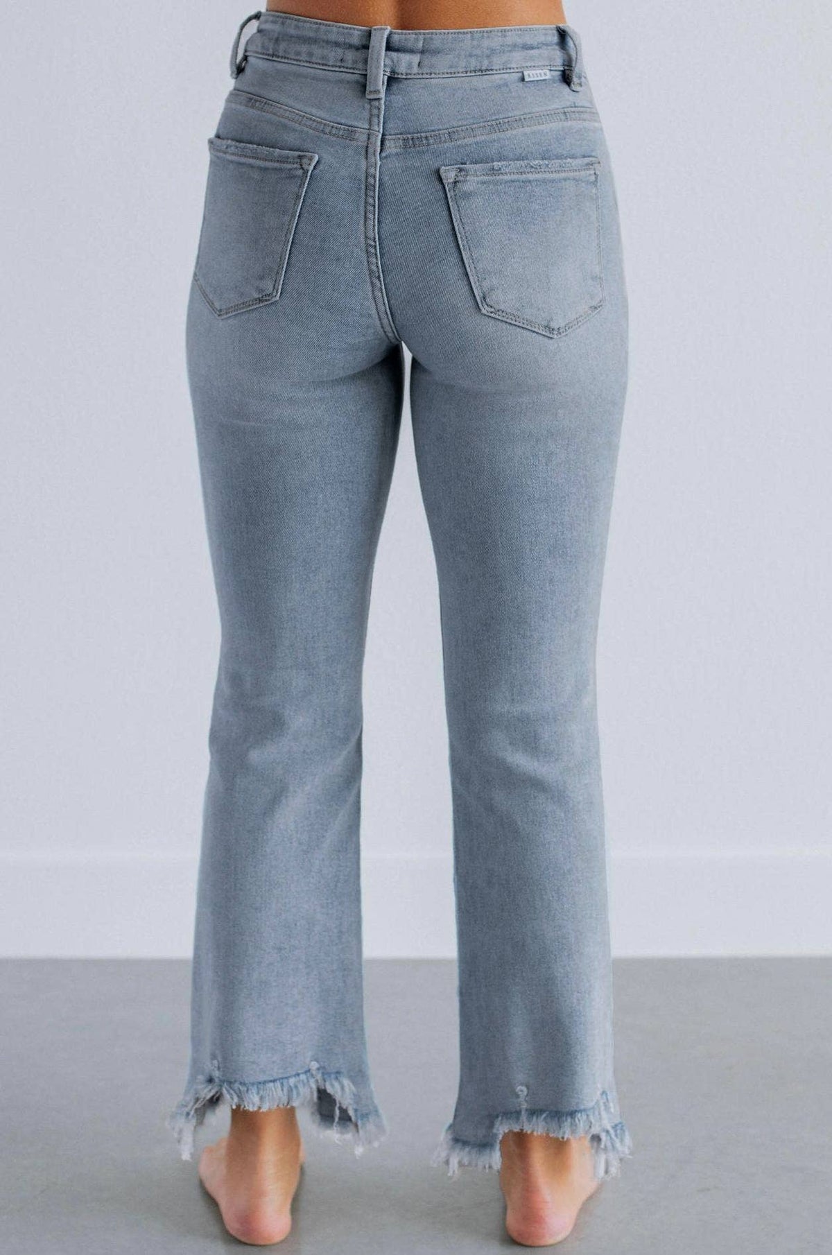 High-waisted ripped frayed straight-leg jeans